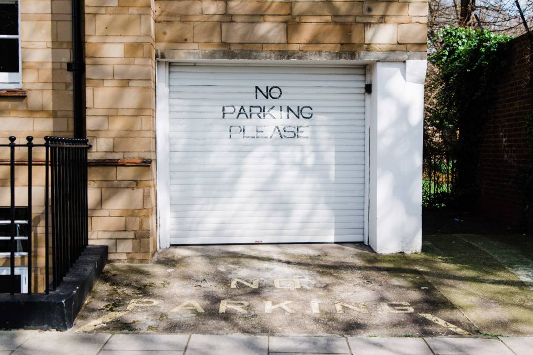 No Parking Please Sign